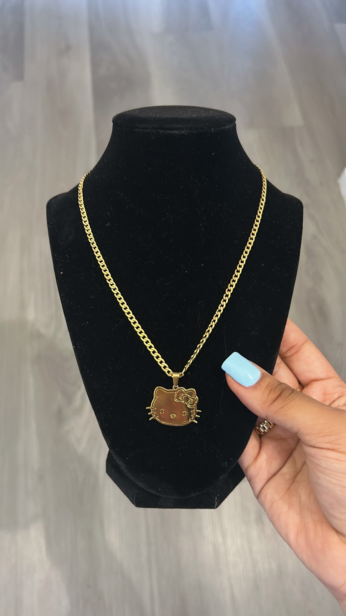 HK FACE NECKLACE